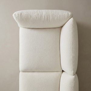 Canapé modulable en tissu bouclé blanc cassé au design moderne et épuré