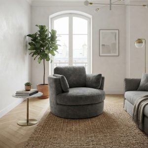 Fauteuil en tissu gris Clarissa dans un appartement lumineux